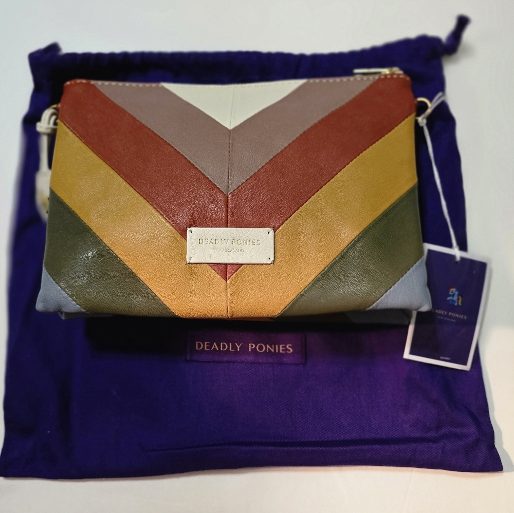 RARE Deadly Ponies Soft Leather clutch with added leather strap. 9in×6 1/4inx3in